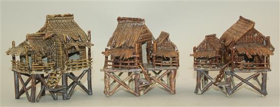 Ten Japanese stoneware models of houses, boats and bridges, early 20th century, tallest 9cm